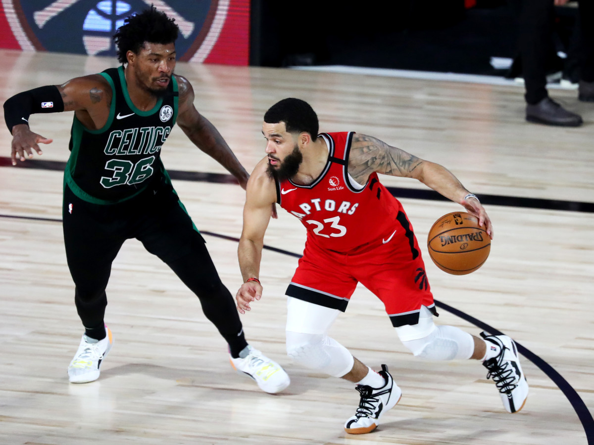 Sep 7, 2020; Lake Buena Vista, Florida, USA; Toronto Raptors guard Fred VanVleet (23) dribbles the ball against Boston Celtics guard Marcus Smart (36) during the second half of game five of the second round in the 2020 NBA Playoffs at ESPN Wide World of Sports Complex.